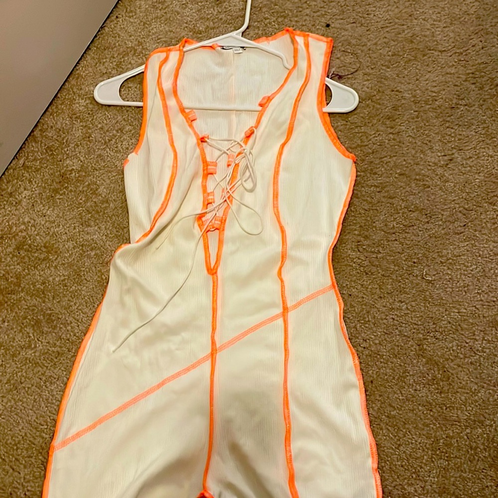White and orange bodysuit